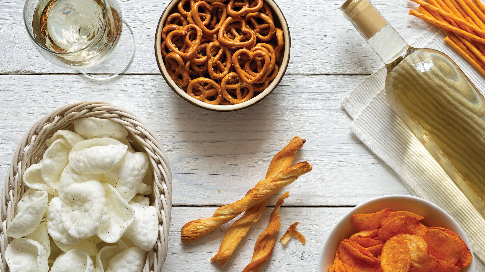 White wine pairing with chips and pretzels.